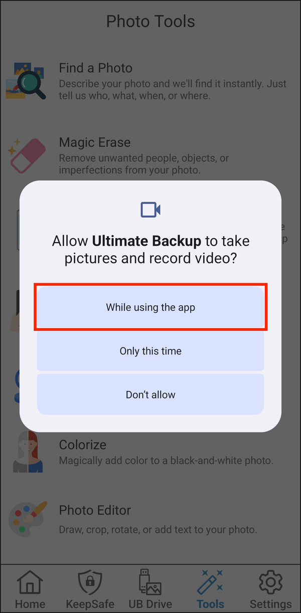 Camera permission prompt with While using the app highlighted
